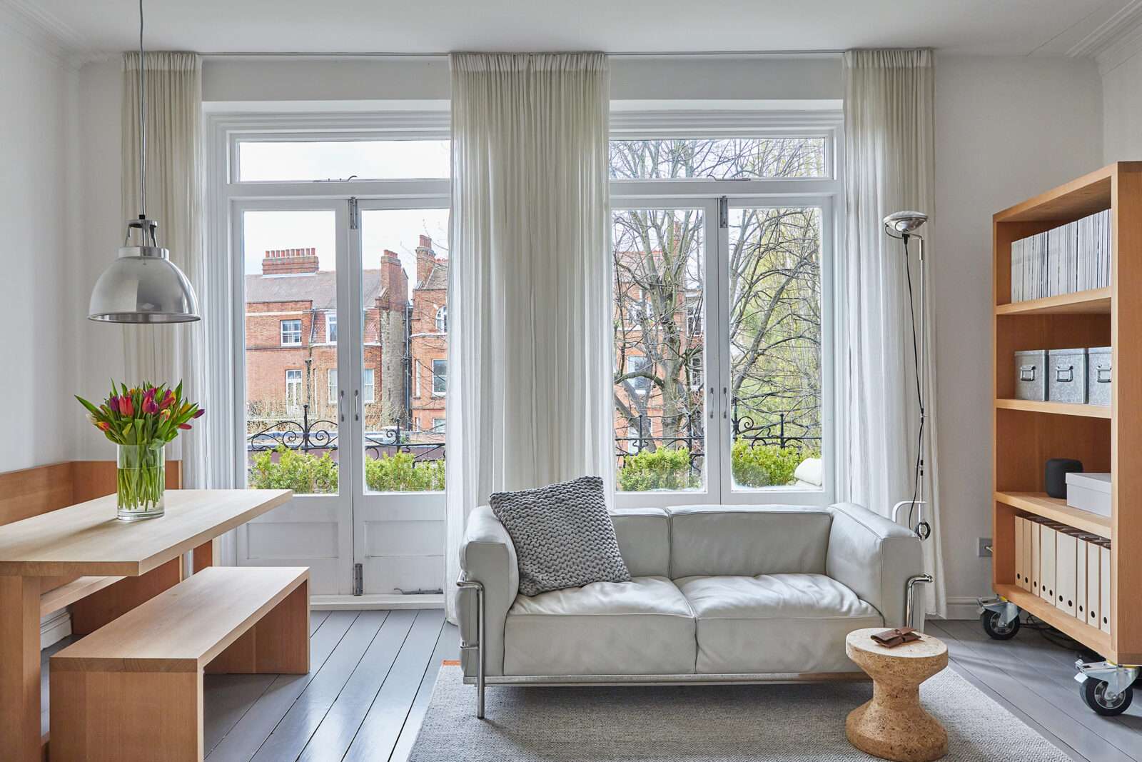 A beautiful Parisian-style apartment in a blue-plaque mansion block, with lush views of Hampstead Heath beyond