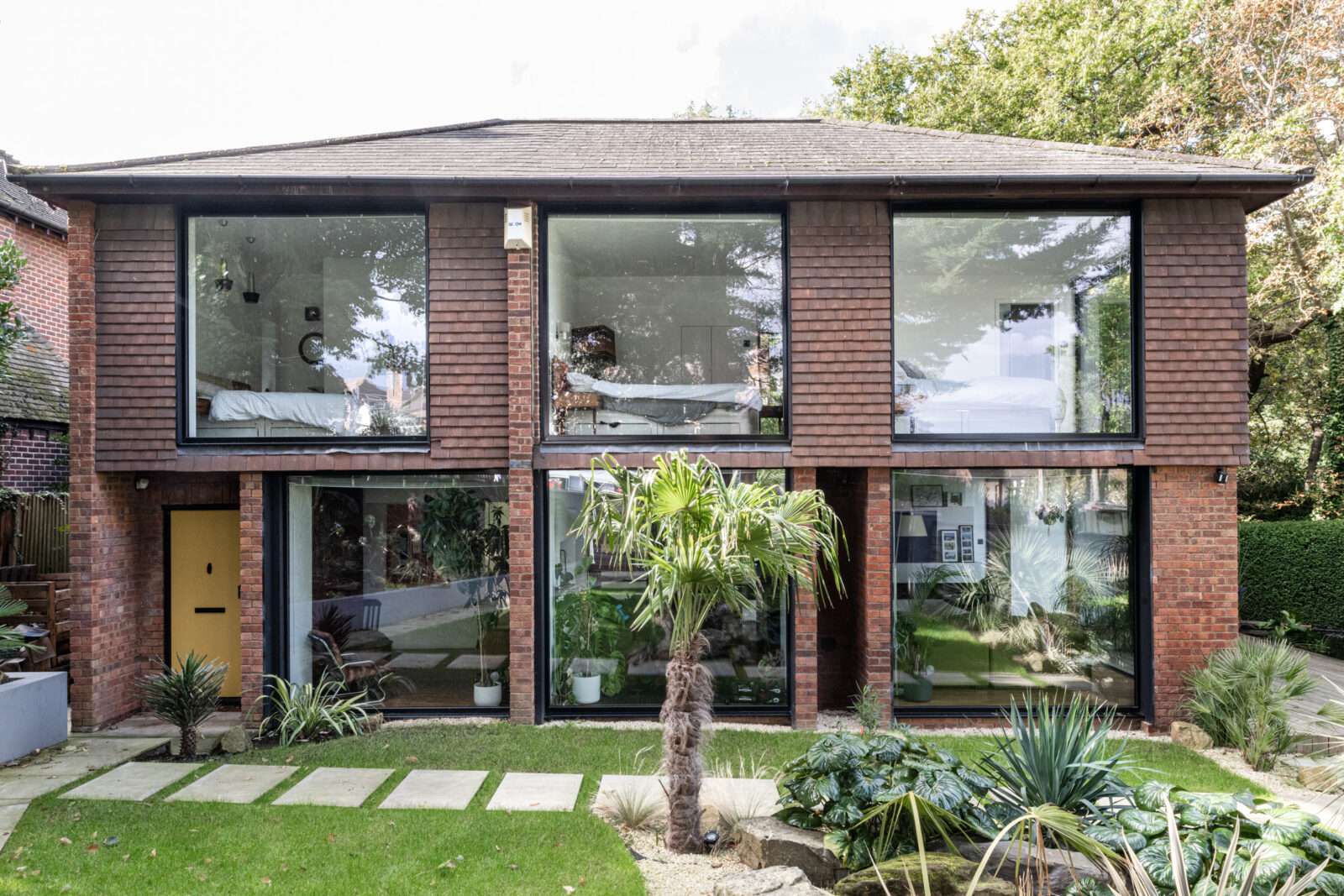 A 1960s house in south-east London transformed for fun and games with a sunken roof terrace, yoga studio and outdoor entertainment room