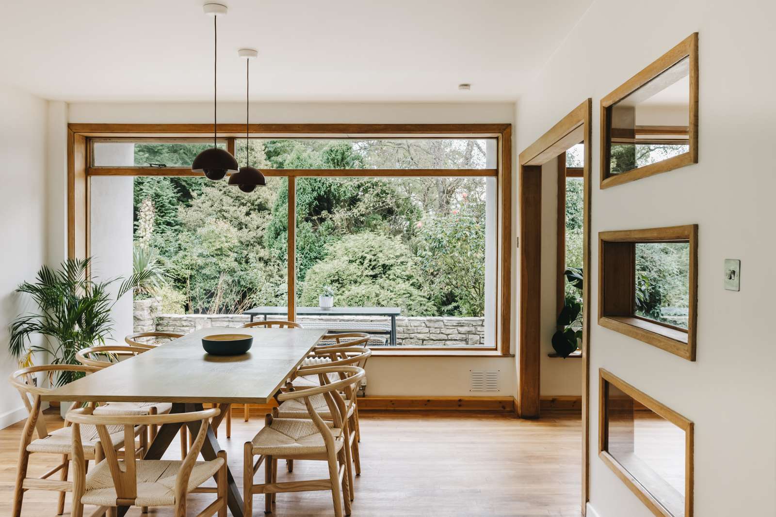 A 1950s mid-century home in Dorset with original wooden interiors and its own characterful cocktail bar