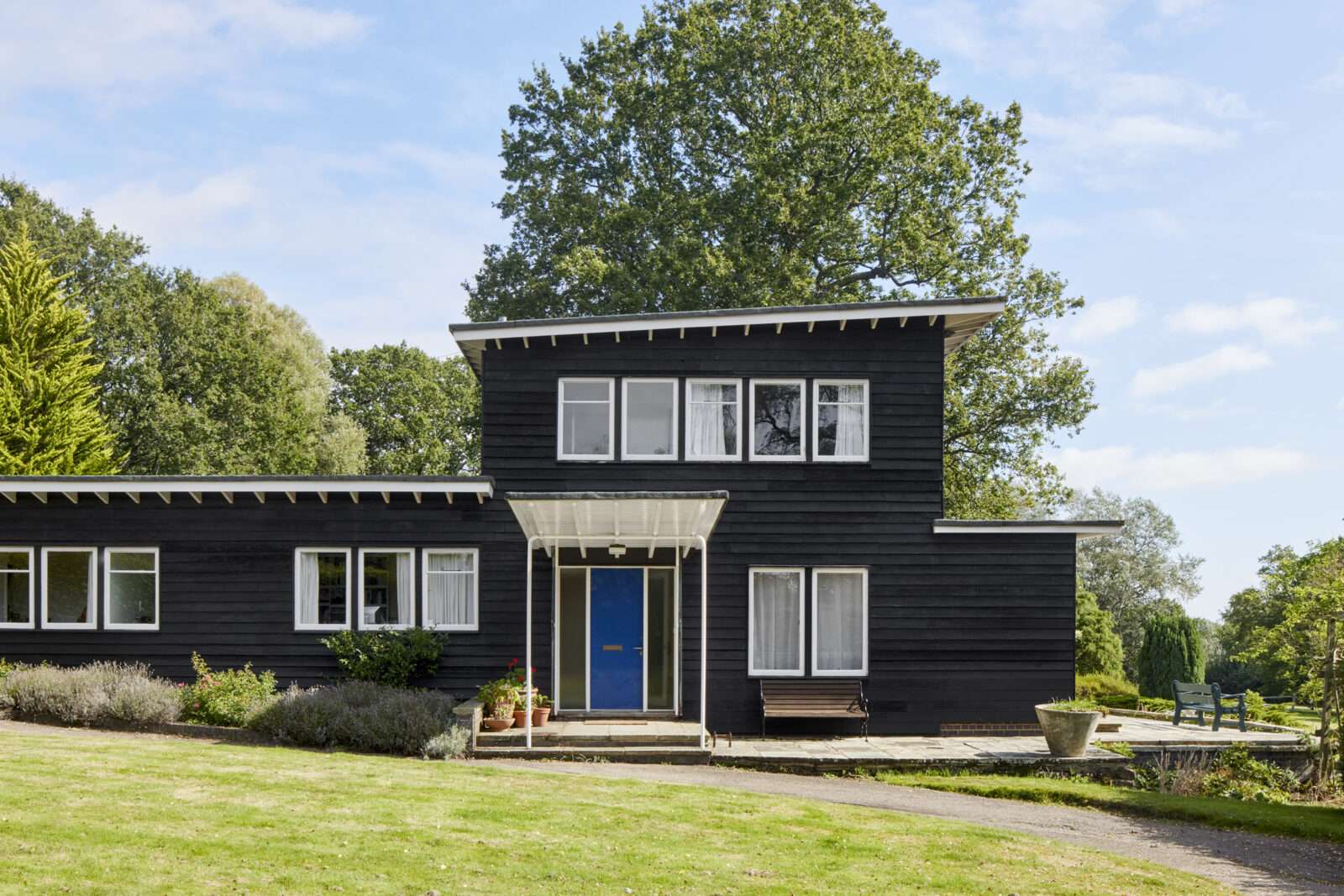 Why did Walter Gropius, founder of the Bauhaus, build a weather-boarded house in Kent?