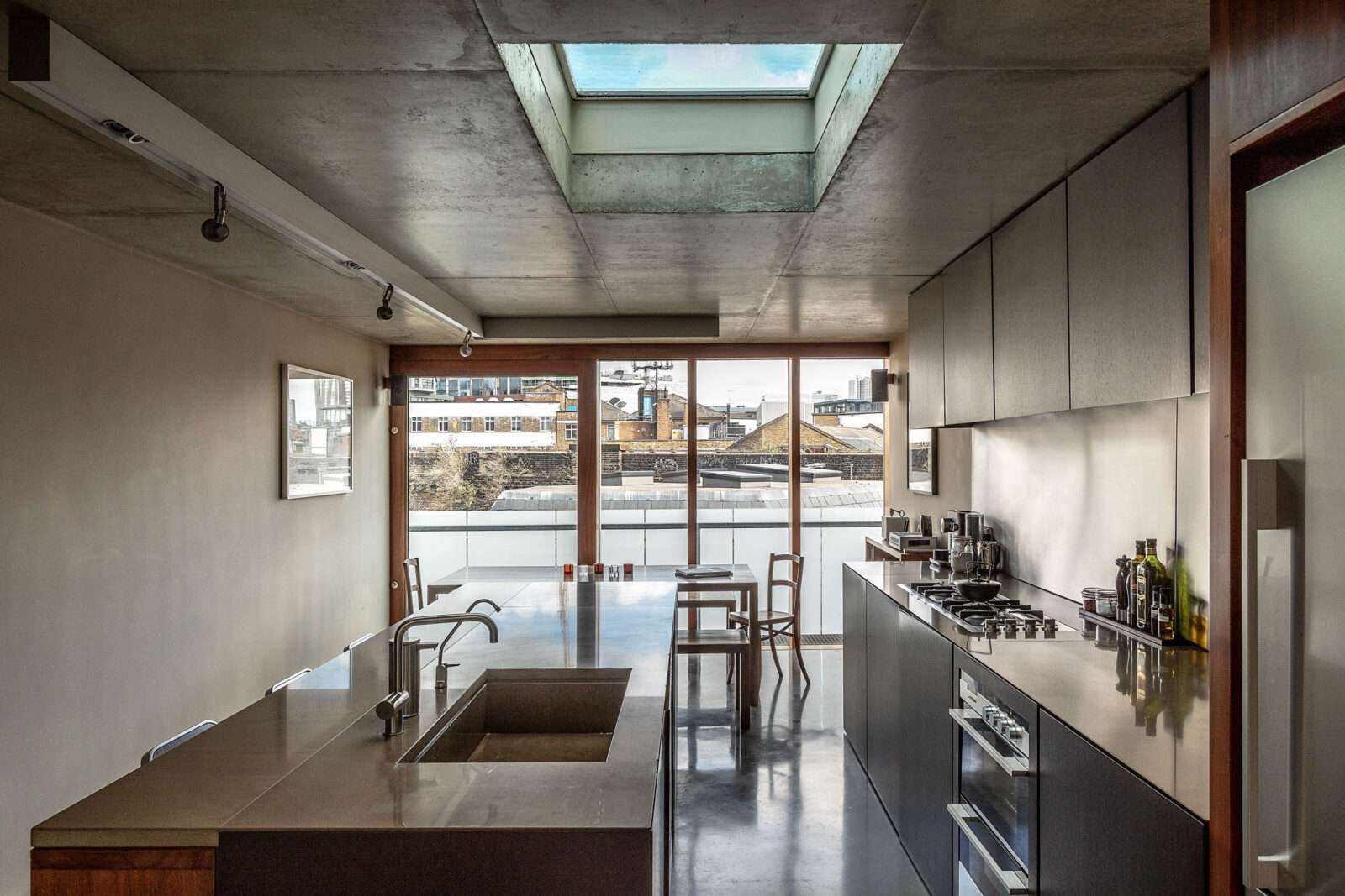 Why an architect built a concrete townhouse on a narrow plot behind a pub in south-east London